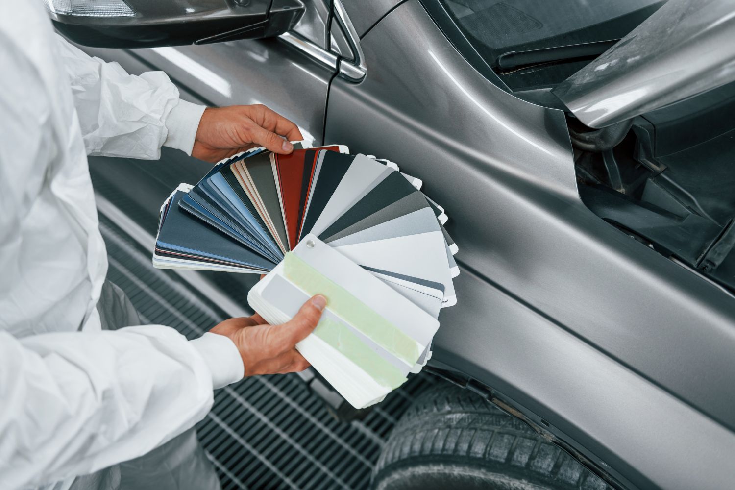 man picking colour for car